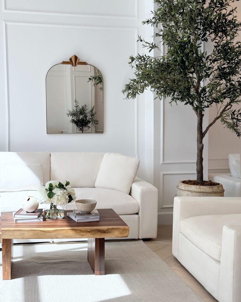 white sustainable couches in pretty eco-friendly living room