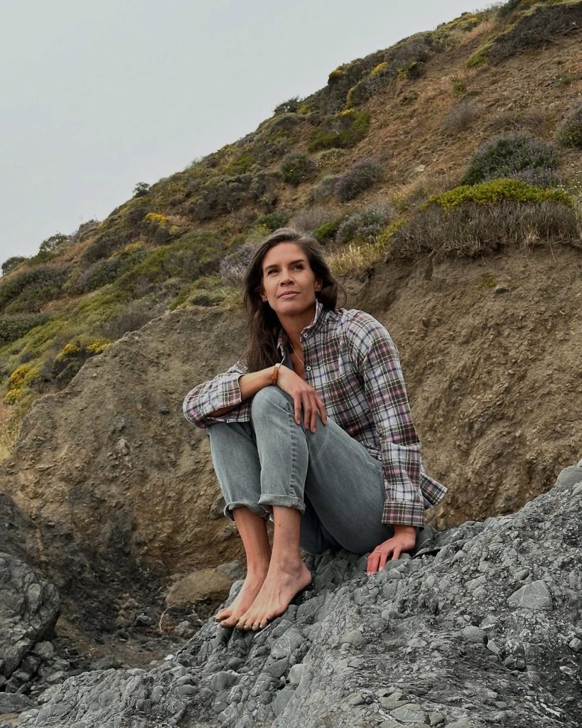 woman wearing an organic flannel from affordable sustainable clothing brand Carve Designs