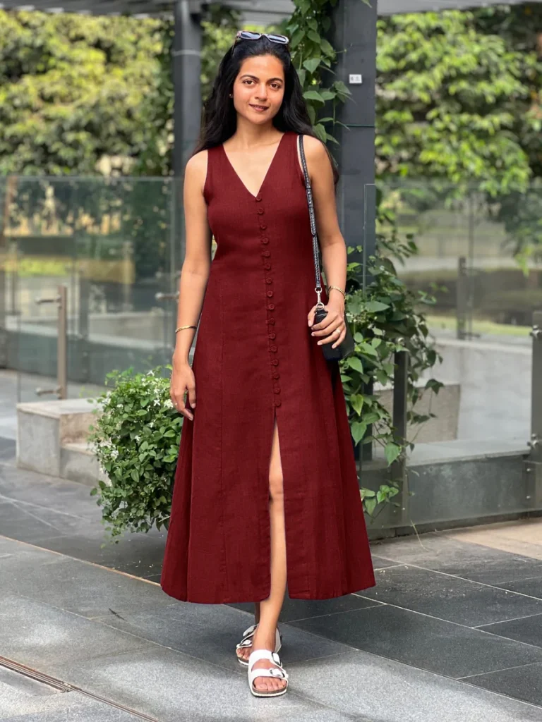 woman wearing red cotton maxi dress from affordable sustainable brand seamsfriendly