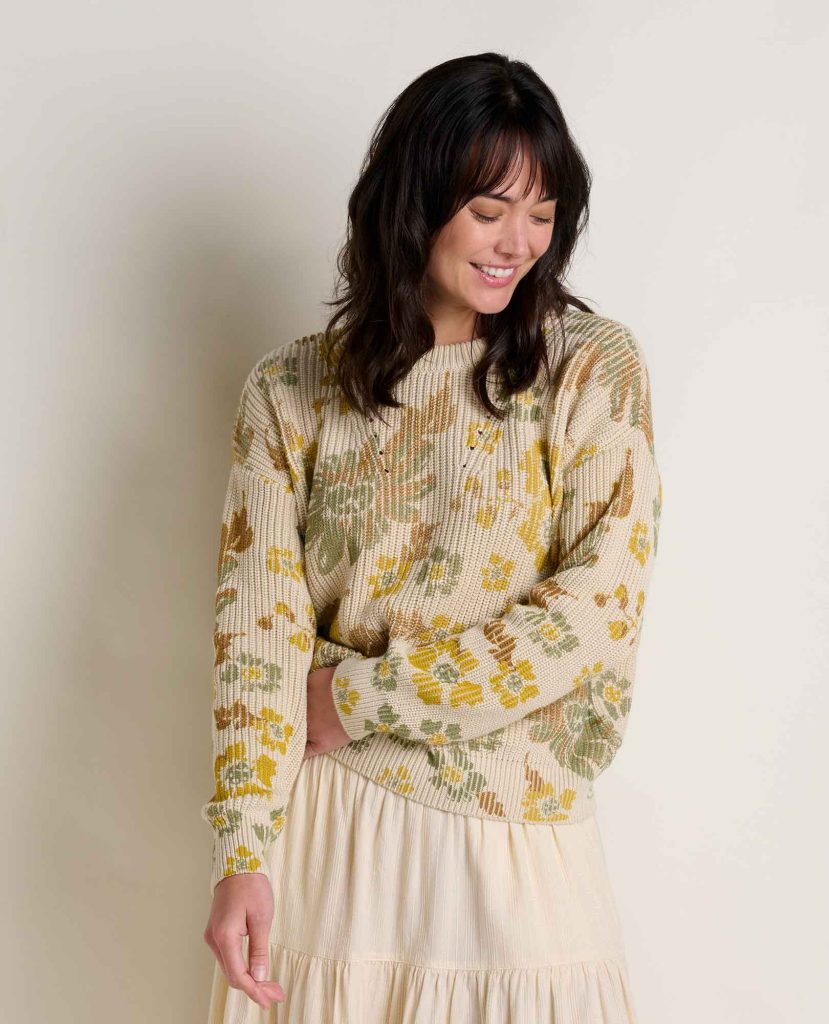 woman wearing a comfy organic sweater by affordable sustainable clothing brand Toad&Co