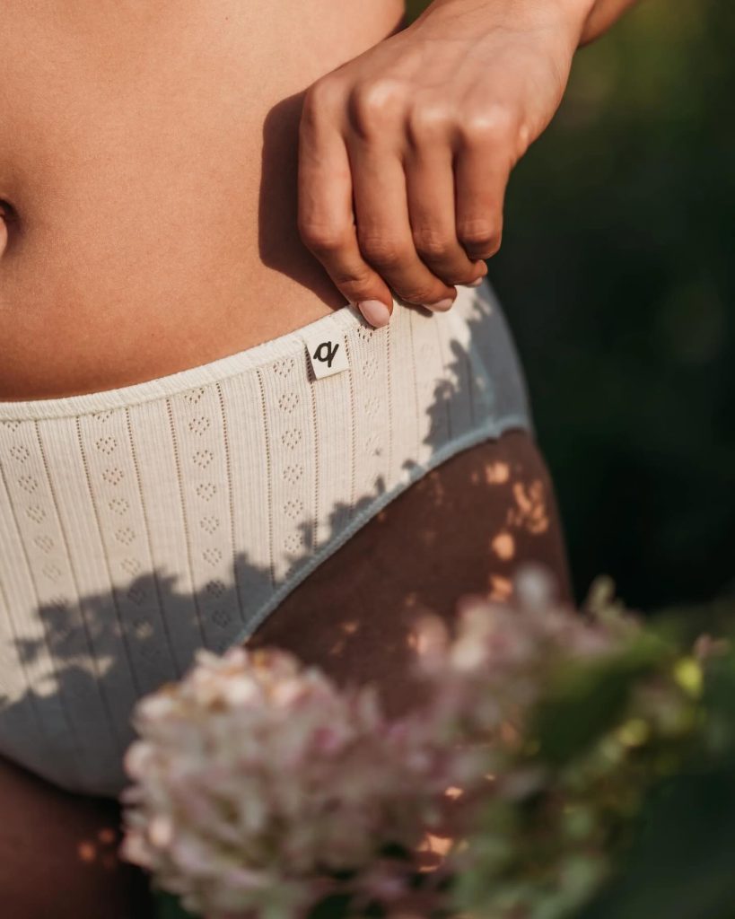 a woman wearing a pair of organic cotton underwear from affordable brand q for Quinn