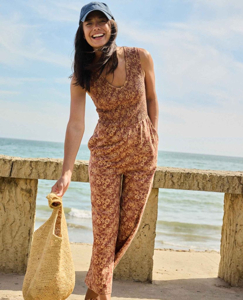 a woman wearing a jumpsuit made from lyocell fabric
